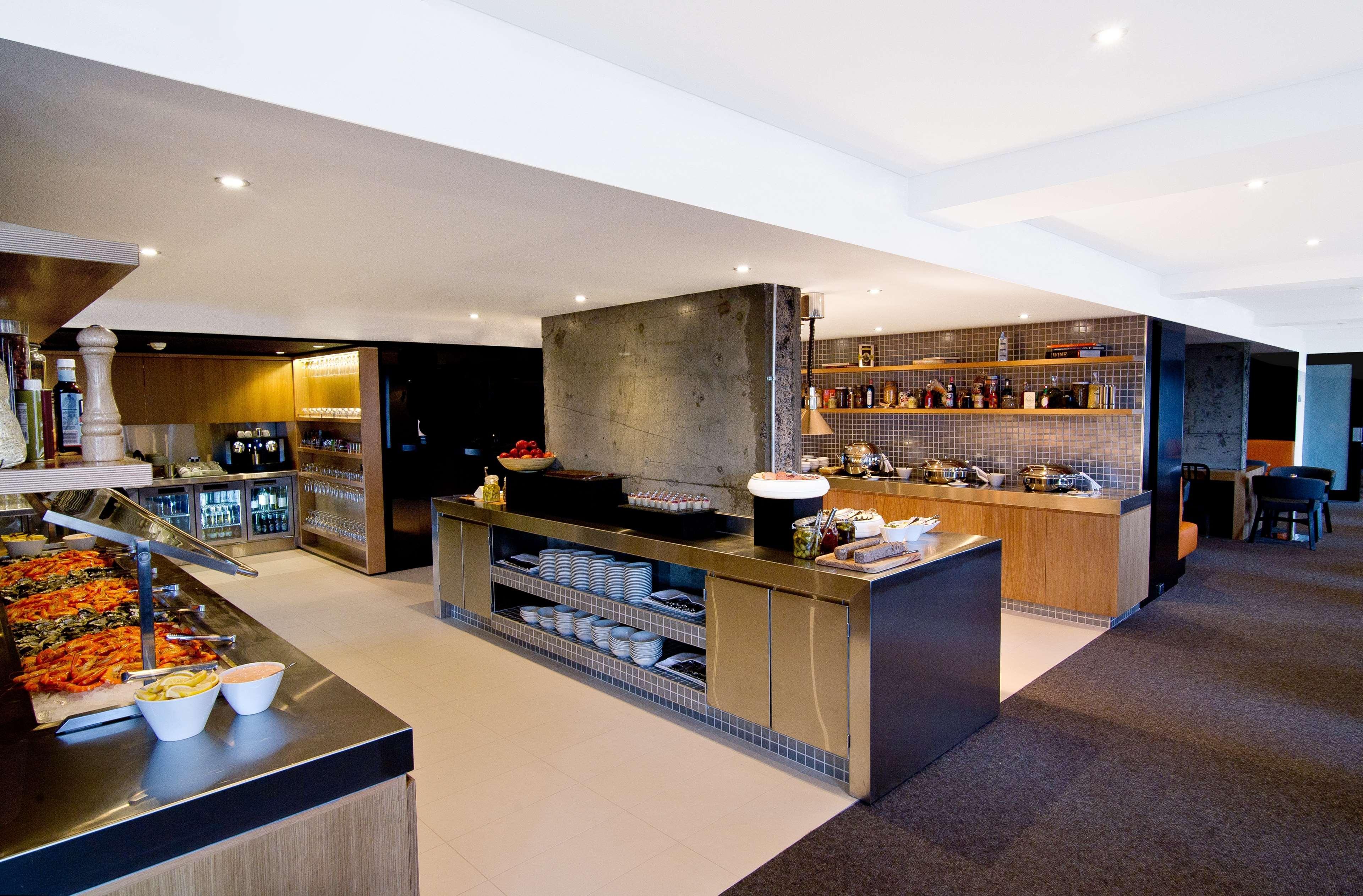 فندق هيلتون سيدني المطعم الصورة The kitchen at the restaurant